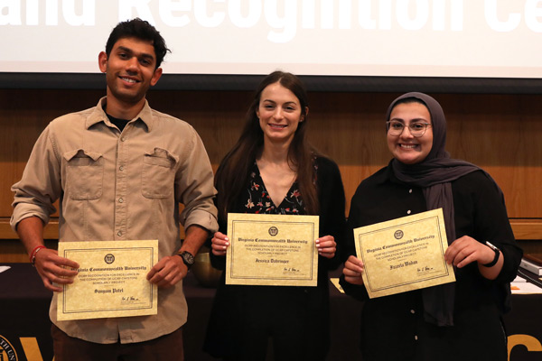 Medical students, class of 2026, Sanyam Patel, Jessica Dahringer and Fazeela Wadan accepting I2CRP Program Recognitions at the Student Awards Ceremony