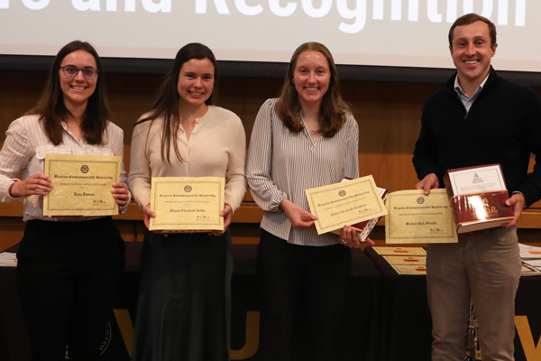 Medical students, class of 2026, Megan Elizabeth Kolbe, Michael Kirk Shields, Dana Dabson and Aiden Elizabeth Lefebvre accepting awards for Merck Academic Excellence Award