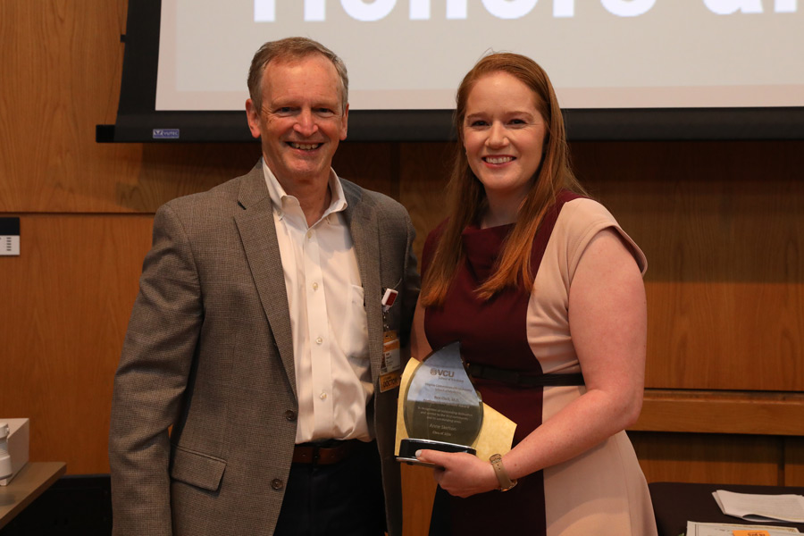 Rob Clark award recepient at the honors ceremony for the School of Medicine Medical Education students